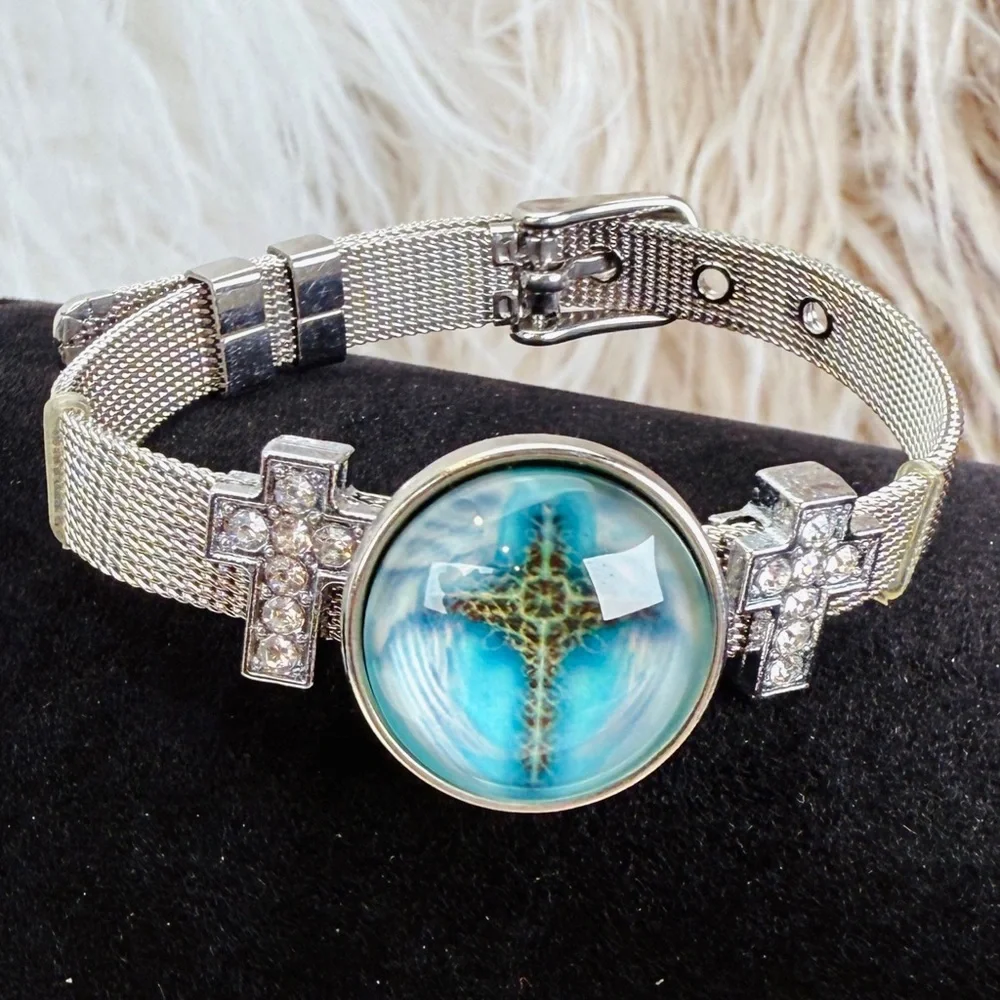 Silvertone Mesh Snap Bracelet with Blue Cross Design